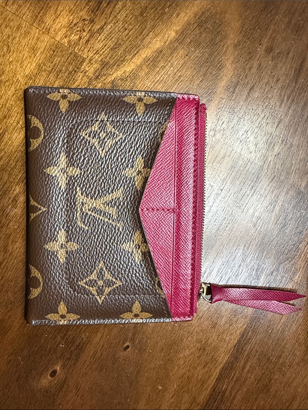 Louis Vuitton monogrammed petite card holder with zipper